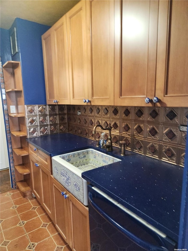 kitchen featuring tile patterned floors and decorative backsplash