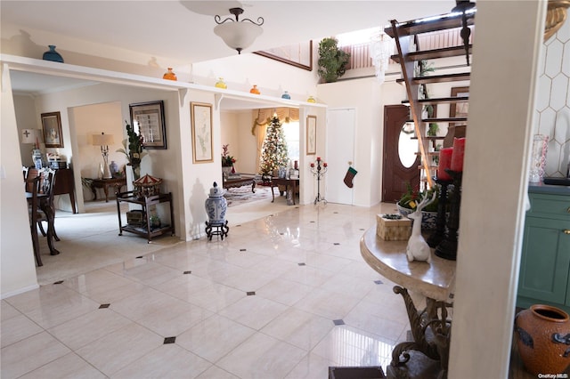 tiled entryway with ornamental molding