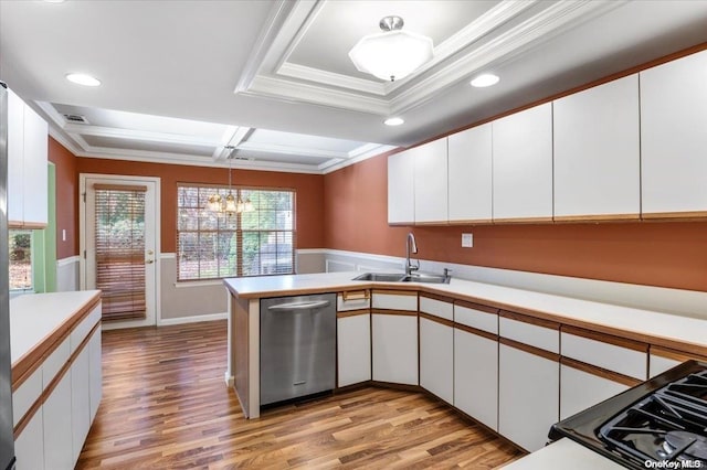 kitchen with a wealth of natural light, white cabinetry, sink, and stainless steel dishwasher