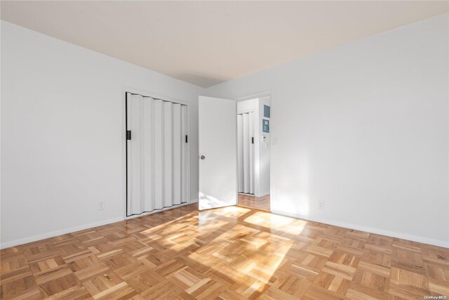 empty room featuring light parquet floors