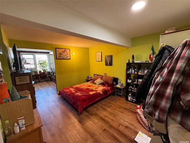 bedroom featuring hardwood / wood-style floors