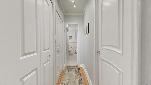 84-51 Beverly Rd Unit 4P, Kew Gardens, NY 11415 - corridor featuring crown molding and light wood-style floors