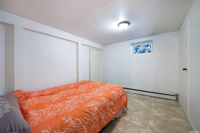 tiled bedroom with baseboard heating