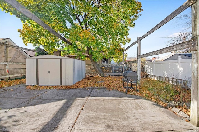 view of patio / terrace with a storage unit