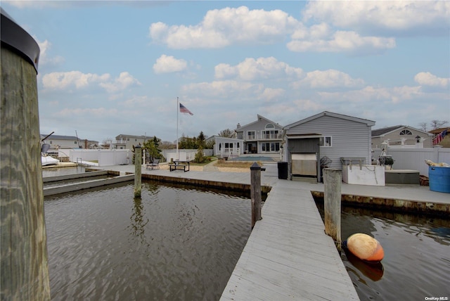 dock area with a water view