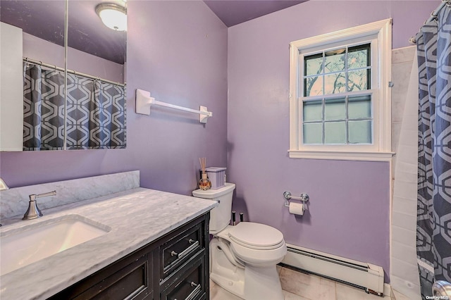 bathroom with toilet, vanity, tile patterned floors, and baseboard heating