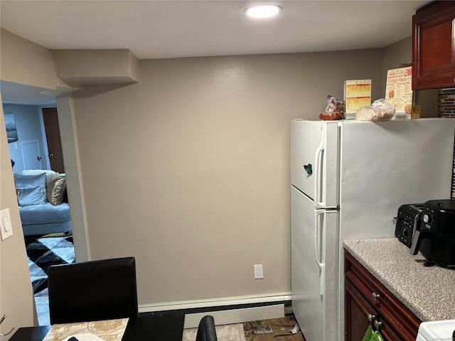 kitchen featuring white fridge