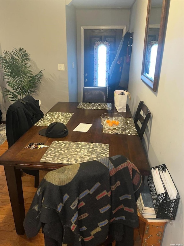 dining space featuring hardwood / wood-style floors