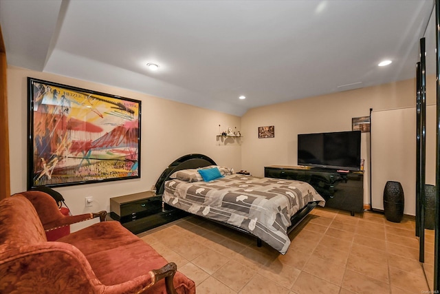 bedroom featuring light tile patterned flooring and recessed lighting