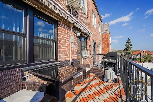 balcony with grilling area and cooling unit