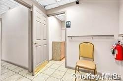 mudroom with light tile patterned floors