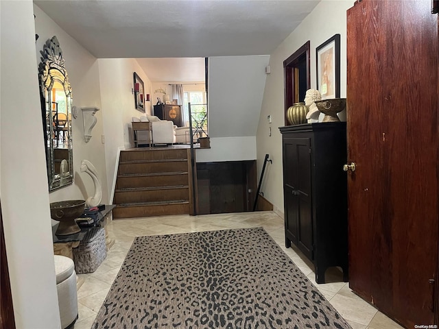 bedroom with light tile patterned floors