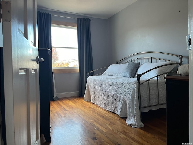 bedroom featuring light hardwood / wood-style floors