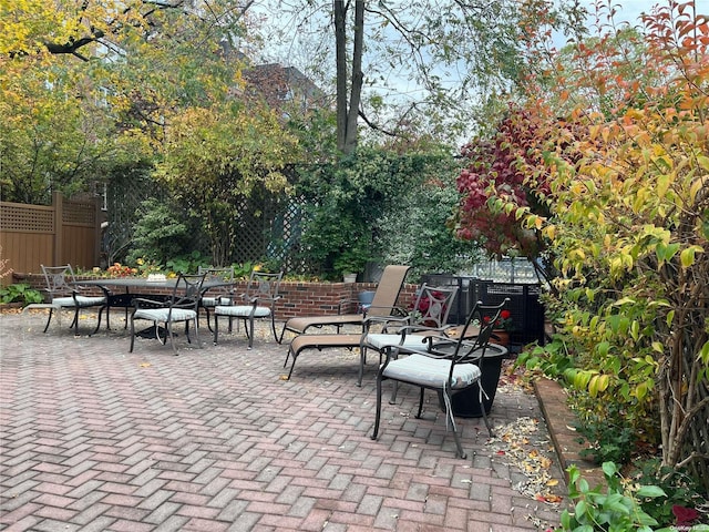 view of patio with an outdoor fire pit