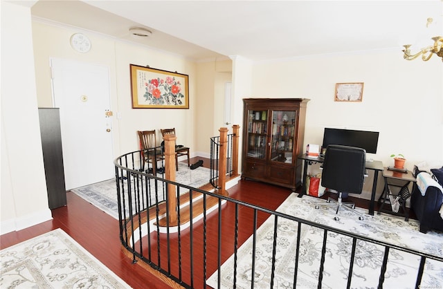 office space featuring dark hardwood / wood-style flooring and crown molding