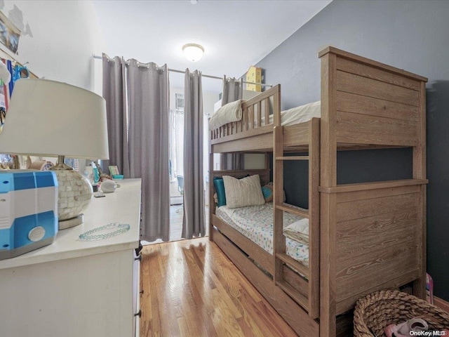 bedroom featuring light wood-type flooring