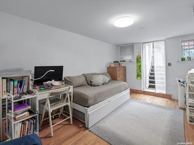 bedroom featuring hardwood / wood-style floors