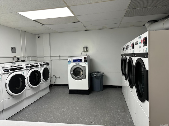 clothes washing area featuring washer and dryer