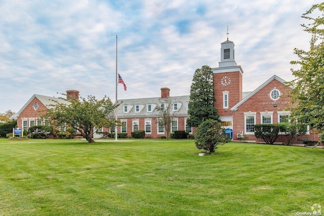 exterior space with a lawn