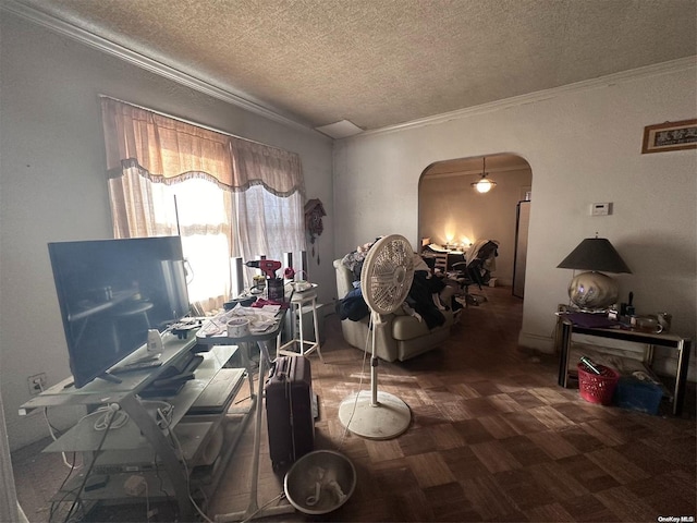 dining area with a textured ceiling and crown molding