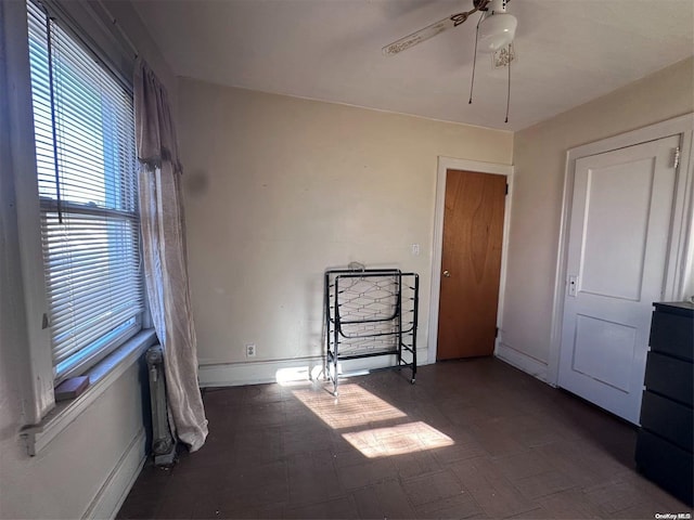 unfurnished bedroom with ceiling fan