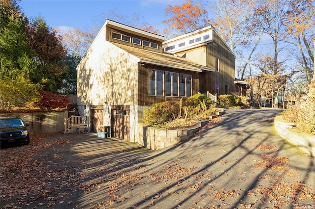 1572 Middle Rd, Calverton, NY 11933 - mid-century inspired home featuring an attached garage