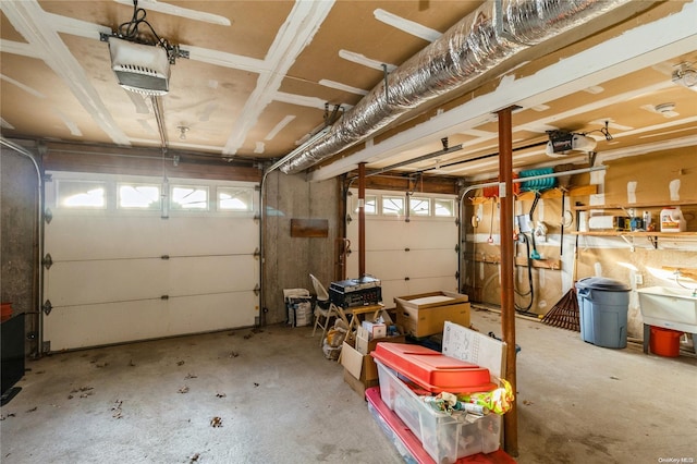 garage featuring a garage door opener