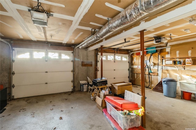 1572 Middle Rd, Calverton, NY 11933 - garage with a garage door opener