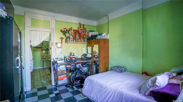 bedroom featuring tile patterned floors