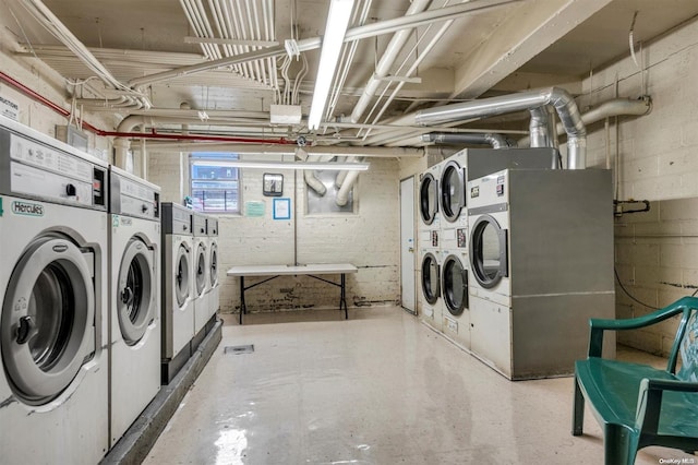 laundry area featuring independent washer and dryer and stacked washing maching and dryer