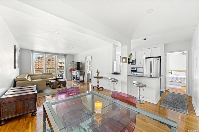 dining space featuring light hardwood / wood-style floors