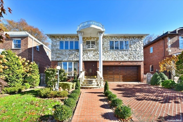 view of front of property with a garage