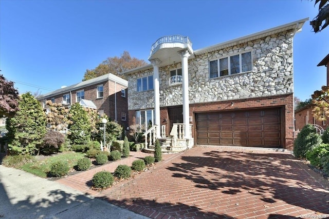 view of front of property with a garage