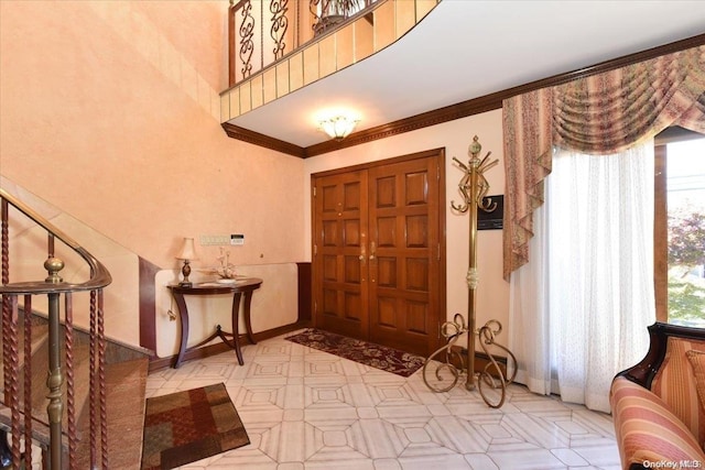 foyer with ornamental molding