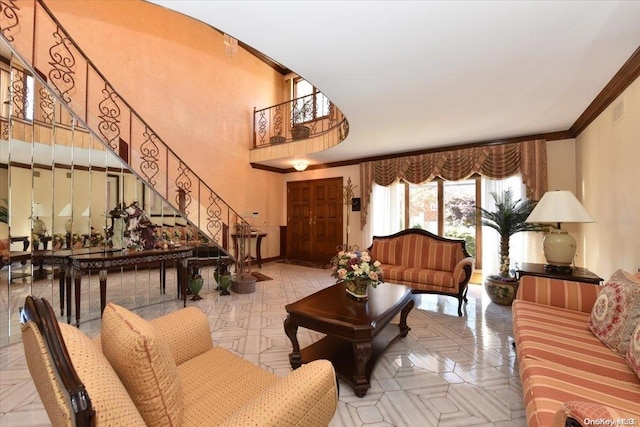 living room with ornamental molding