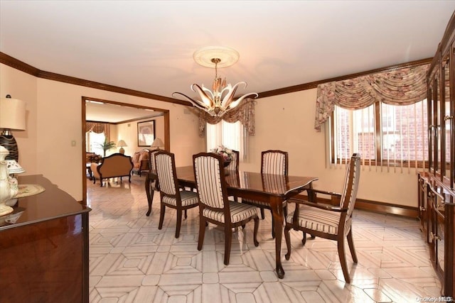 dining room featuring ornamental molding and an inviting chandelier