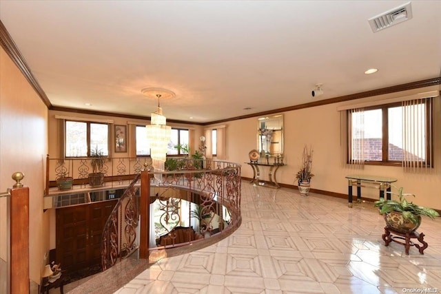 interior space featuring a wealth of natural light and crown molding