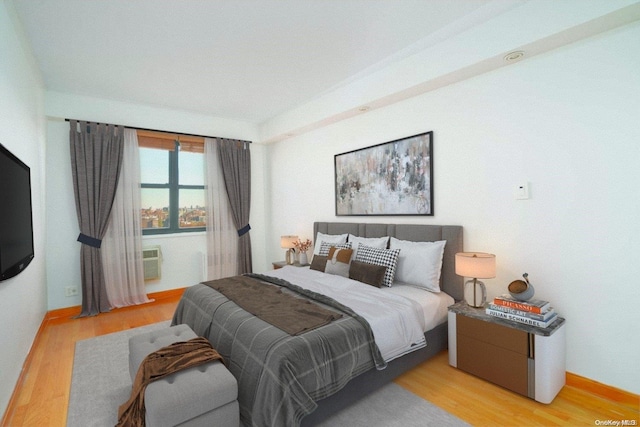 bedroom with light hardwood / wood-style flooring