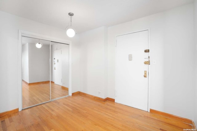 unfurnished room featuring hardwood / wood-style floors