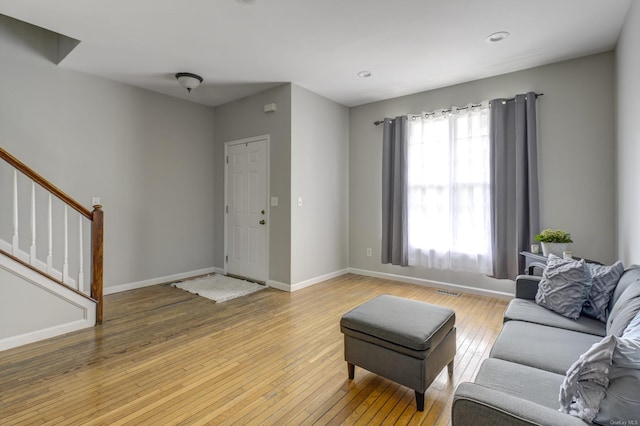 living room with hardwood / wood-style flooring