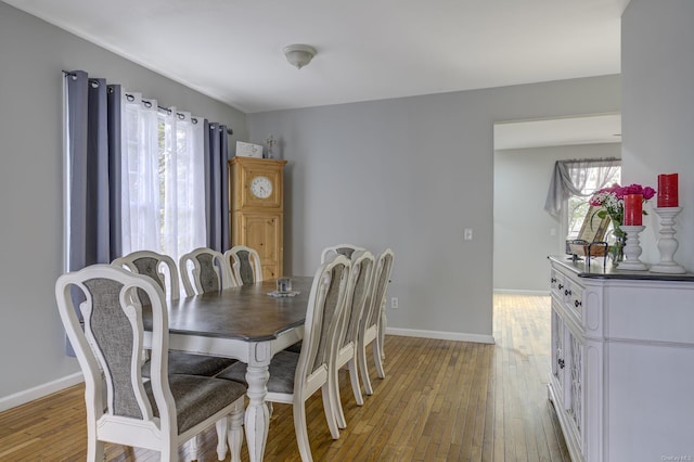 dining space featuring light hardwood / wood-style floors