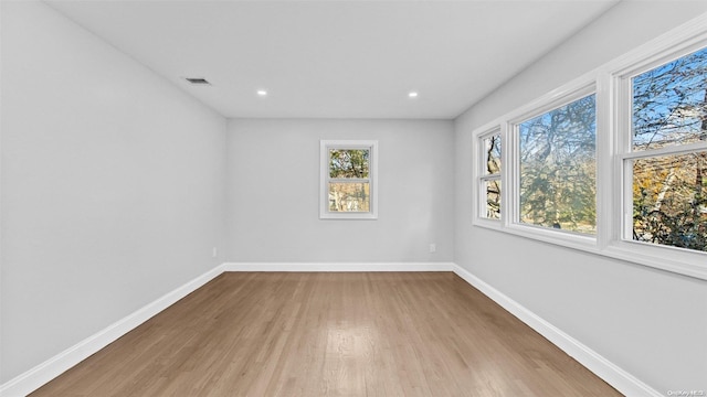 unfurnished room featuring light wood-type flooring