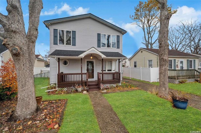 43 2nd St, Ronkonkoma, NY 11779 - view of front of home with a porch