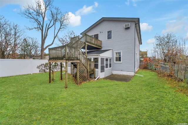 43 2nd St, Ronkonkoma, NY 11779 - back of property featuring stairs and a wooden deck