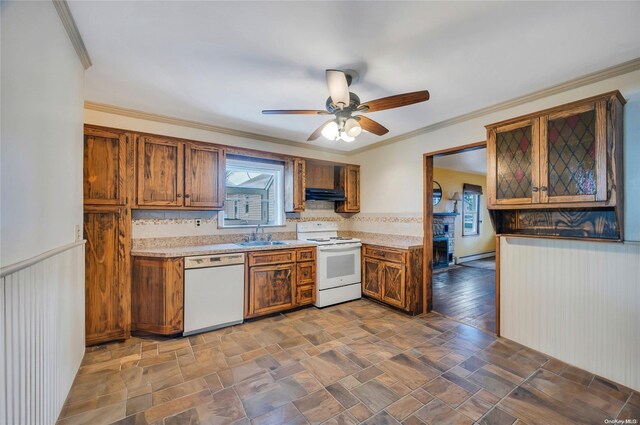 43 2nd St, Ronkonkoma, NY 11779 - kitchen with white appliances, under cabinet range hood, light countertops, a sink, and crown molding