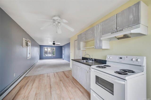 43 2nd St, Ronkonkoma, NY 11779 - kitchen featuring electric range, a baseboard heating unit, a sink, under cabinet range hood, and ceiling fan