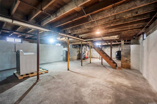 43 2nd St, Ronkonkoma, NY 11779 - below grade area featuring washer / dryer and stairway