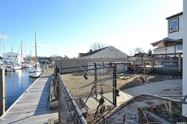 dock area with a water view