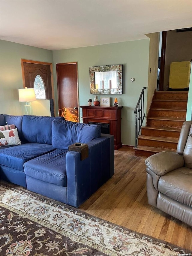 living room featuring dark wood-type flooring