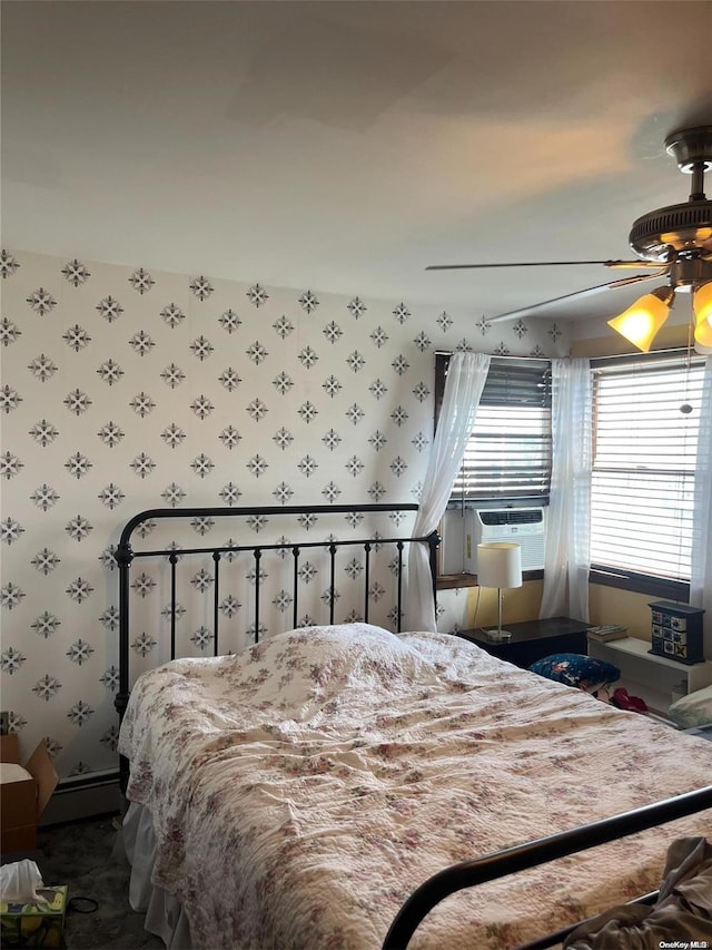 bedroom with ceiling fan and cooling unit